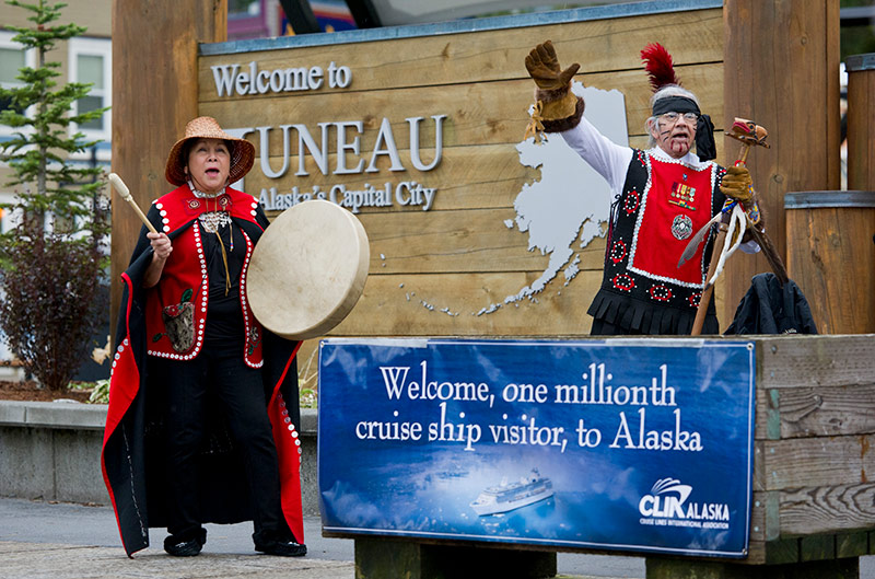 Members of the Yees Ku Oo dance group sang and pounded drums as the millionth cruise passenger was welcomed to Alaska.