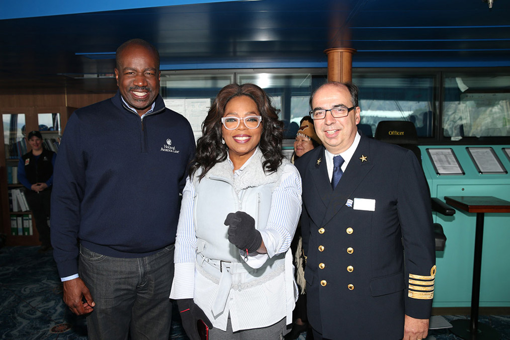 Holland America President Orland Ashford and Eurodam Captain show Oprah around the bridge.