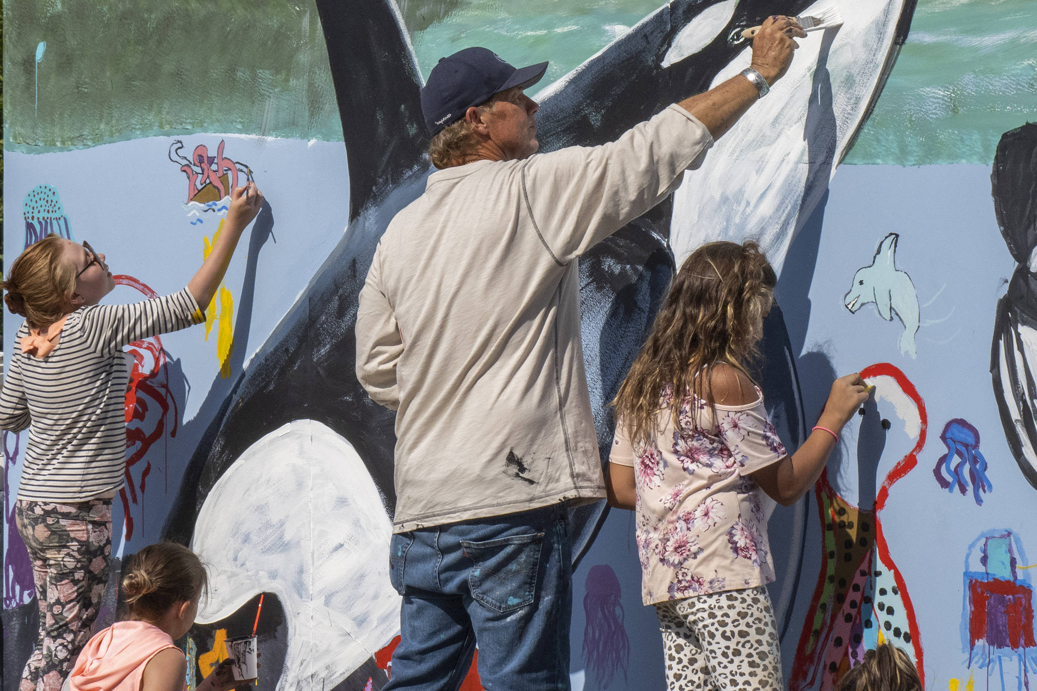Artists, kids paint mural at Icy Strait Point in Hoonah