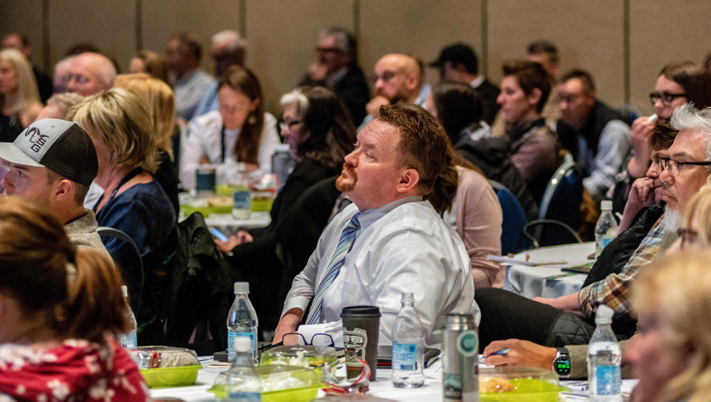 Hilton Anchorage General Manager Steve Davis listens to the cruise panel. Courtesy ATIA/Frank Flavin